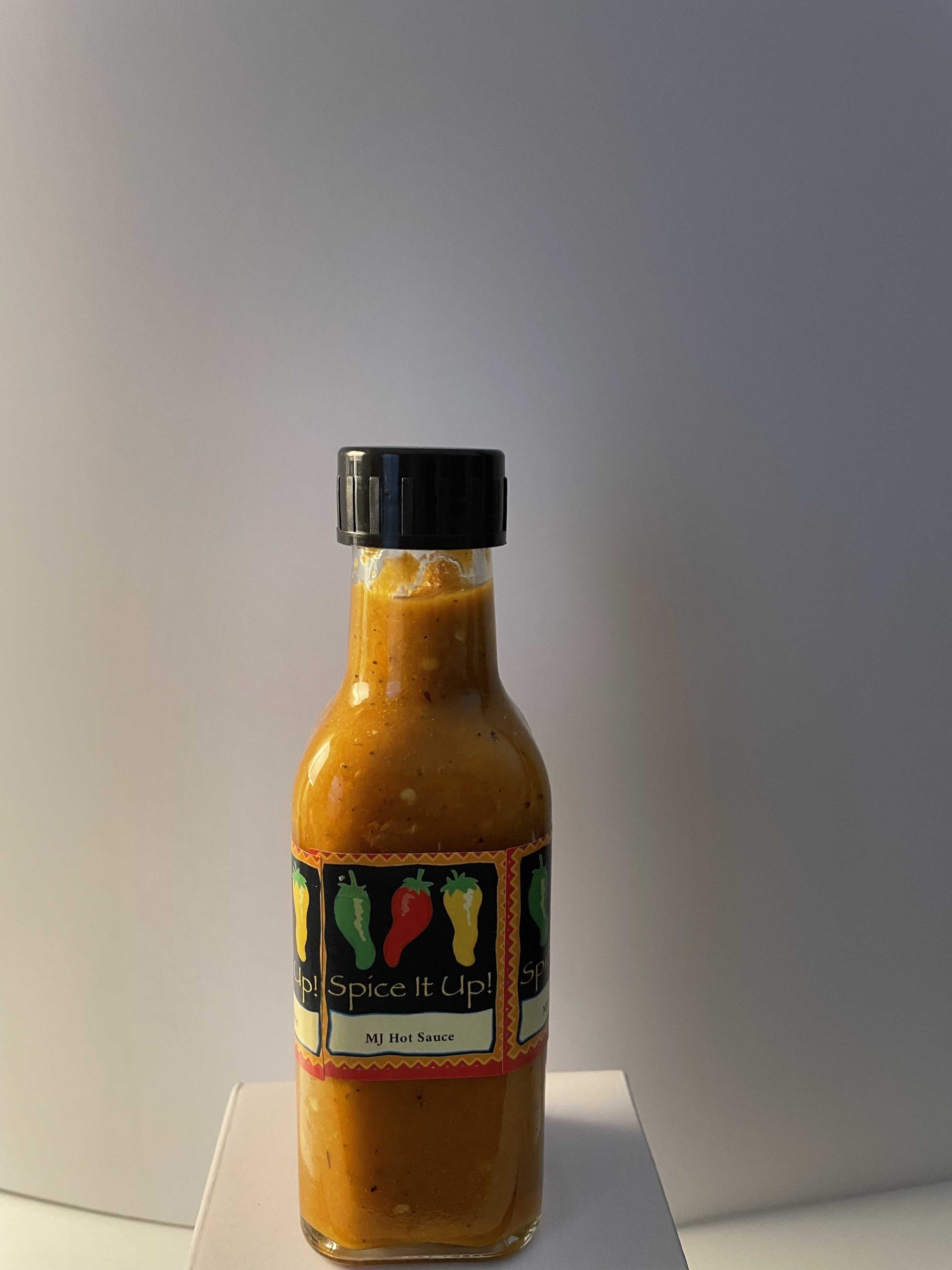 MJ's Original Caribbean Hot Sauce bottle with tropical label design